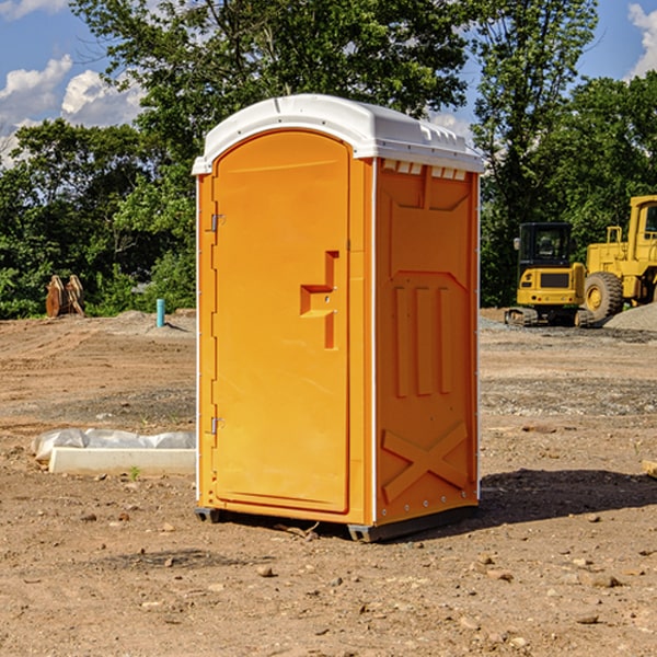 how often are the porta potties cleaned and serviced during a rental period in Wann